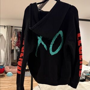 Black Hoodie with Green and Red Accents